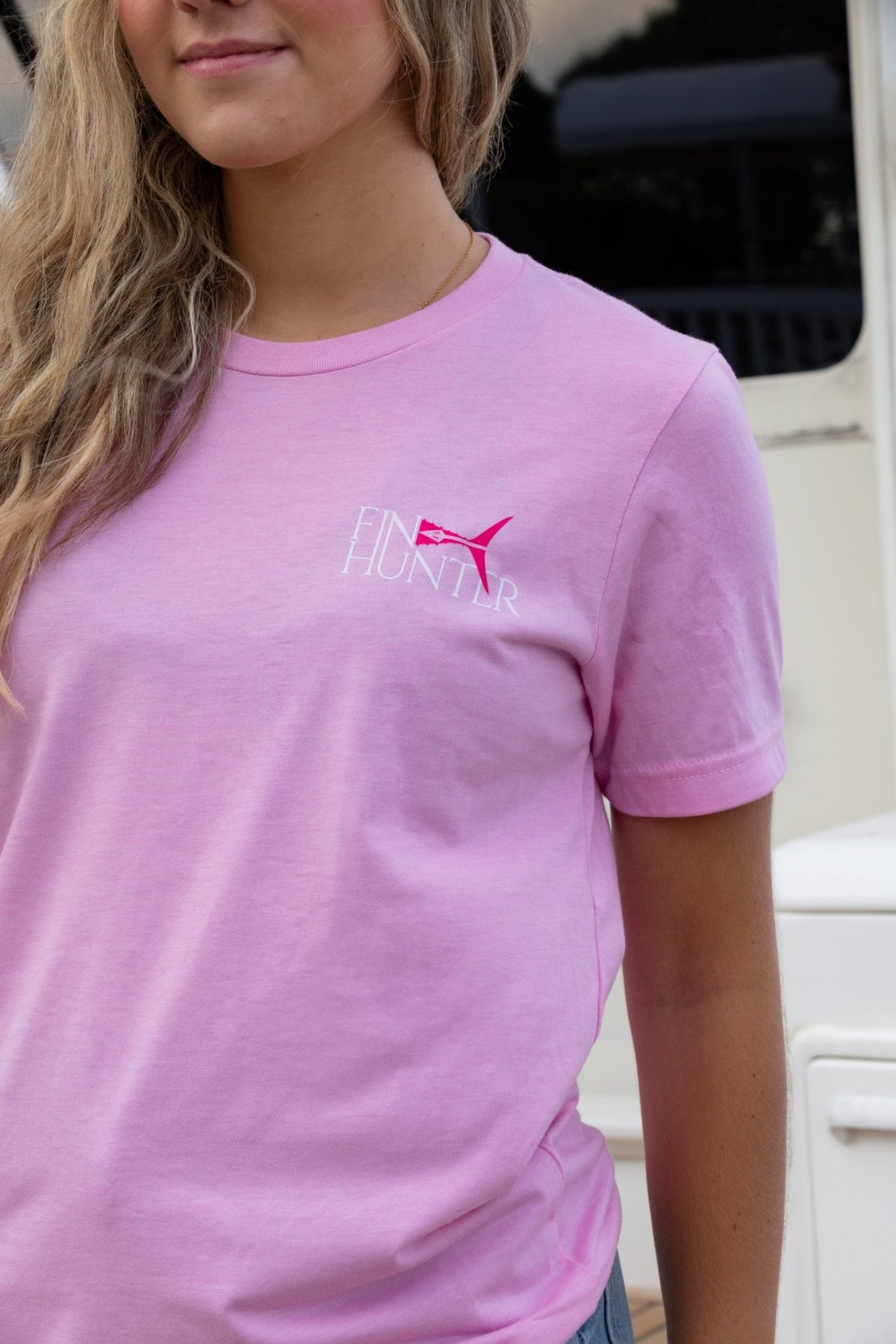 Close-up of the Fin Hunter chest logo on the Tail Pink Camo T-Shirt